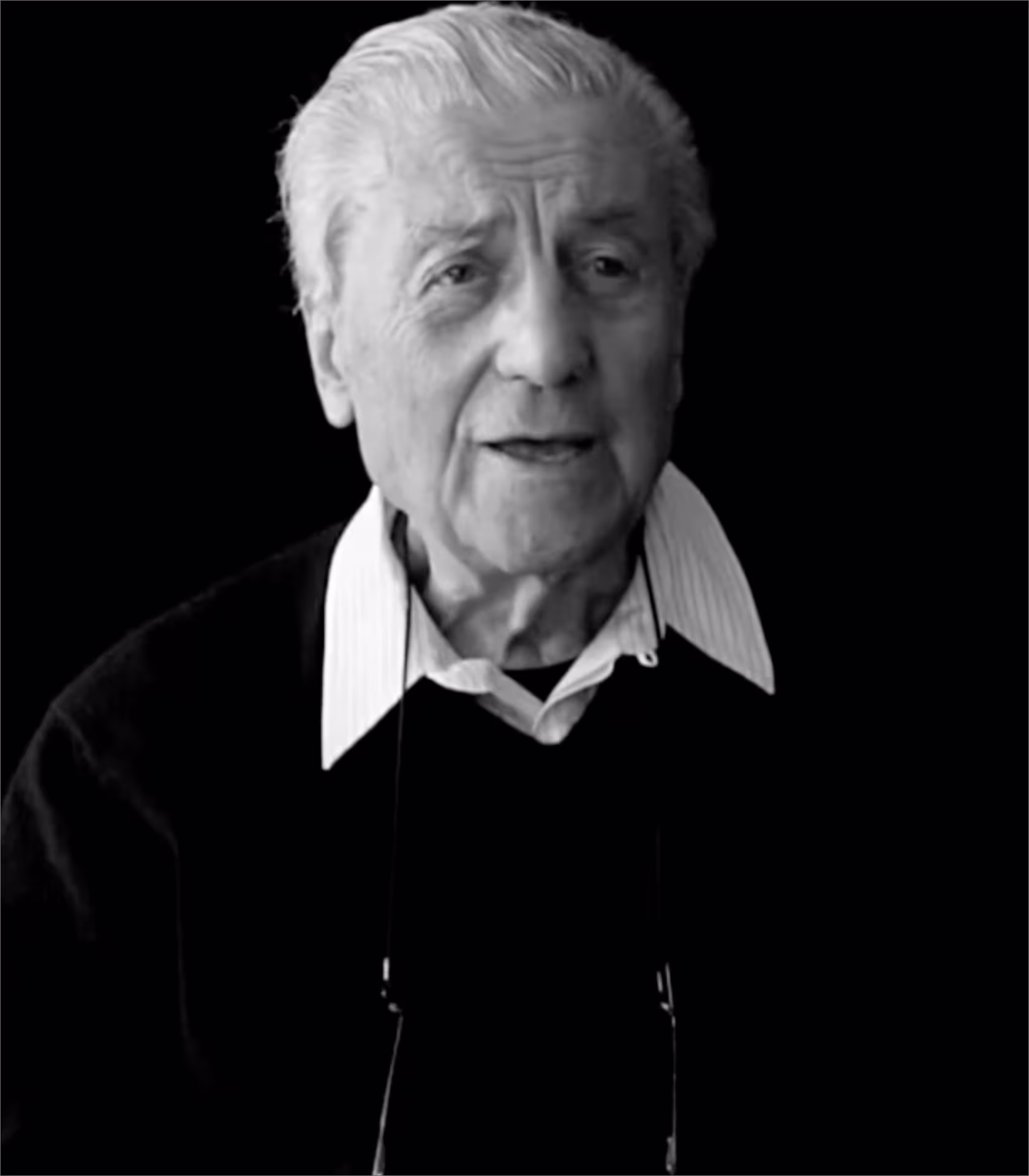 Nino Cerruti and Lou Dalton collaboration film still, black-and-white portrait composition